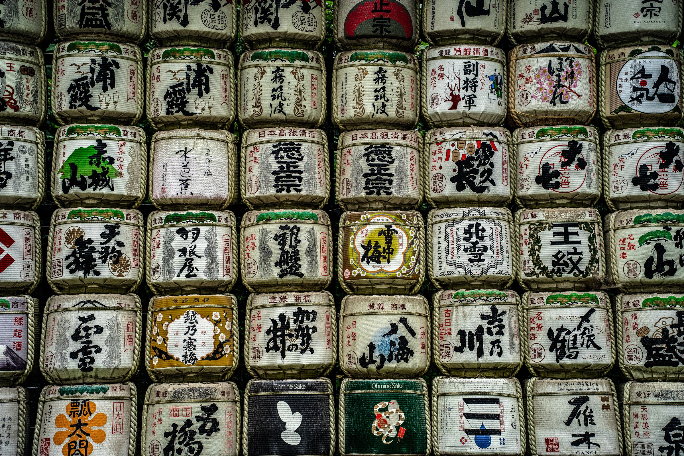 Wall of decorative sake barrels at Meiji Shrine, Tokyo